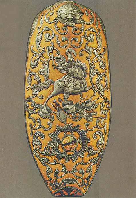 Изображение Затыльники тульских ружей богато украшались гравировкой и золочением. Кроме того, они имели продолжение на гребнях прикладов, которые защищали эти поверхности от механического повреждения при зарядке ружей. 