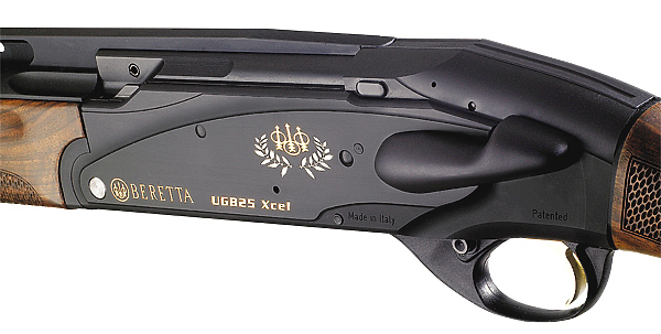 Изображение Слева на коробке расположен рычаг отпирания ствола.