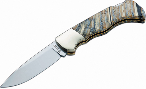 Изображение Модель 2013 года (слева), раскупленная еще до начала ее производства. Рукоять из редкого дамаска стоит дороже клинка. 