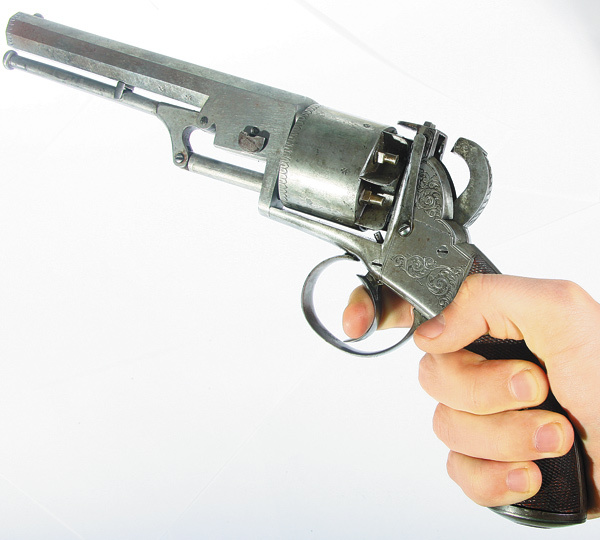 Изображение Классическая бескурковая модель типична для Англии 50-х годов девятнадцатого столетия, и в то же время это явное подражание Кольту.