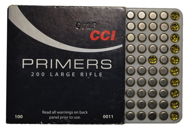 Изображение Капсюля системы Боксера. Западные для винтовочных патронов (на рис. слева); отечественные капсюля КВ-22 для гладкоствольных ружей (справа).