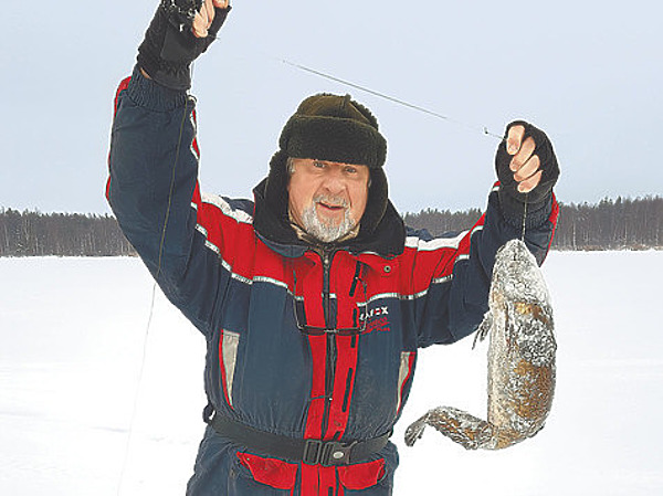Изображение Павел Гусев и налим.